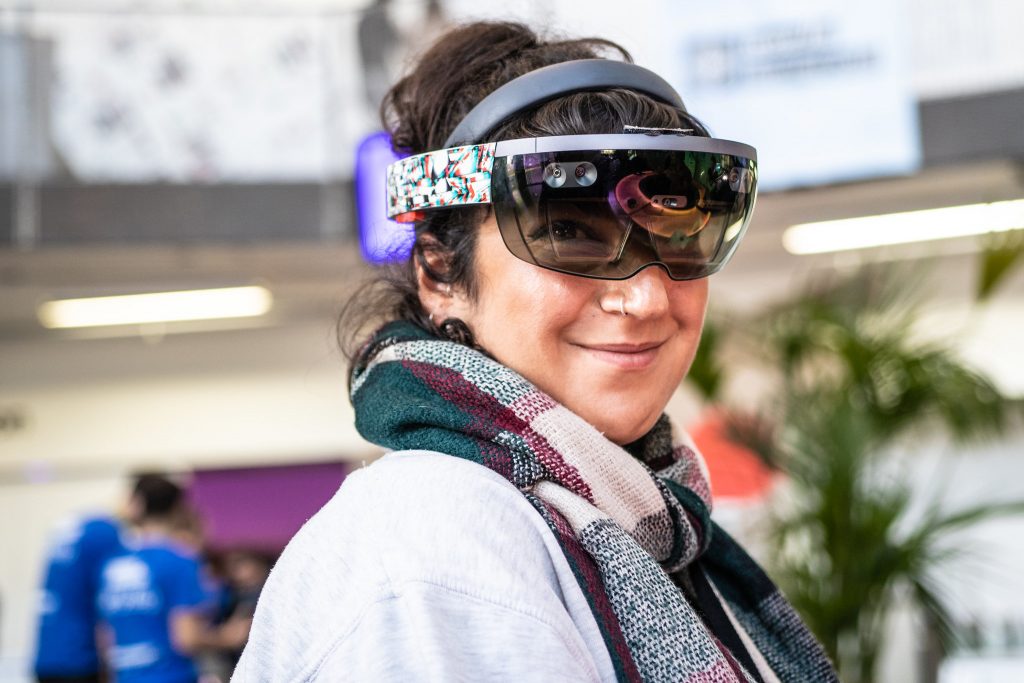 Event attendee trying an augmented-reality headset