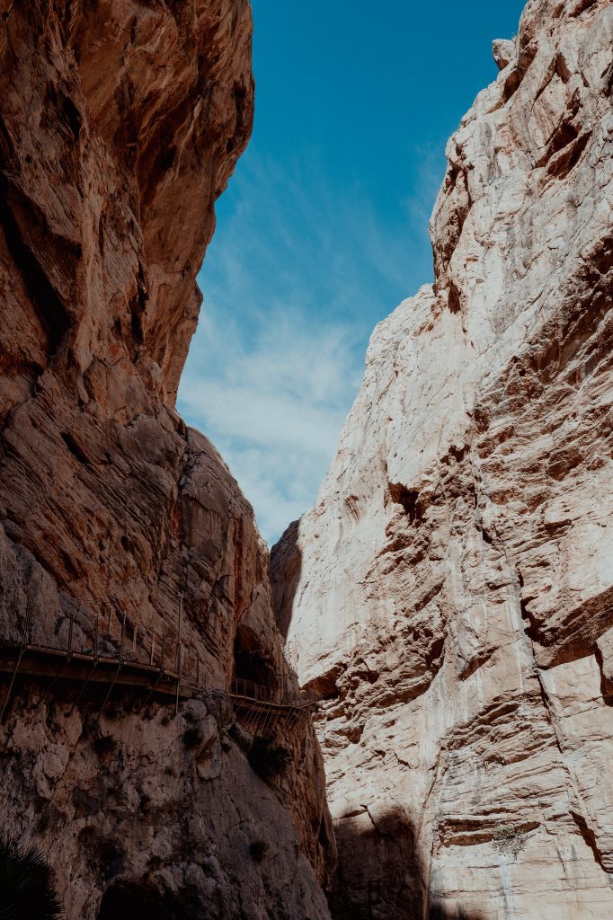 Blue sky seen through a narrow rock gorge