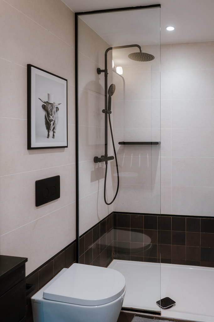 Compact ensuite shower room with black fittings