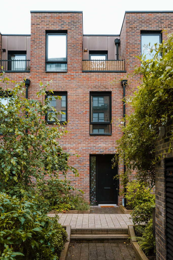 Rear brick exterior and planted courtyard